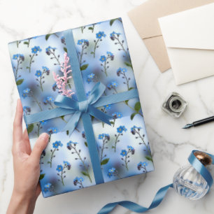 Fijne vergeet-mij-nietjes in luchtig blauw cadeaupapier
