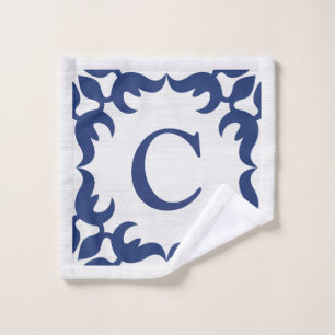 filigraan ingelijst monogram in marineblauw washandje