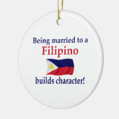 Filipino bouwt karakter keramisch ornament (Links)