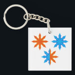 Fire and Ice Eight Point Stars Sleutelhanger<br><div class="desc">Keep your keys organized with this eye catching fire and ice eight point star keychain. The miniature version of this vibrant symmetrical graphic showcases the intense contrast between orange and blue elemental tones. This modern geometric accessory is a great way to add a pop of color and personality to your...</div>