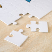 Flamingo als surfer met surfplank legpuzzel (Zijkant)