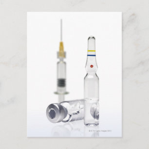 Flesjes die geneeskunde voor injecties bevatten en briefkaart