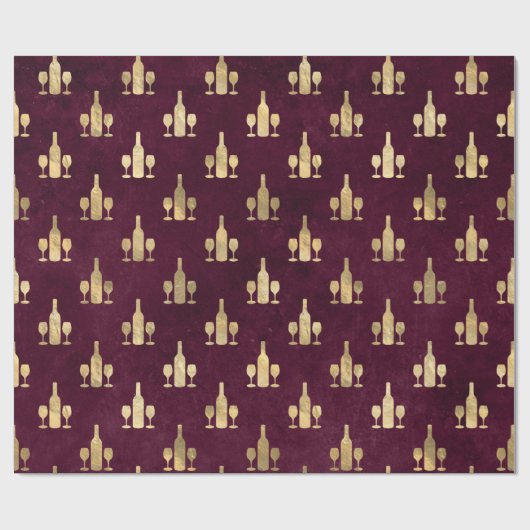 Flessen en glazen metaal-goudwijn op maroon cadeaupapier (Vlak)