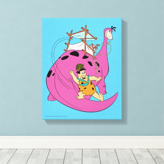 Flintstenen | Fred Sliding Down Tail Canvas Afdruk (Insitu (Houten vloer))