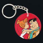 Flintstenen | Wilma Kissing Fred Sleutelhanger<br><div class="desc">Kijk naar Wilma die binnenleuning om Fred te kussen.</div>