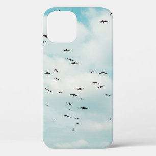 Flock of grey dove fly on vintage blue sky. above Case-Mate iPhone case