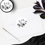Floral Black and White Wedding Envelope Seal/Favor Ronde Sticker<br><div class="desc">Elegant bruiloft sticker met prachtige,  met de hand getekende florale details in het zwart met de initialen van het paar. Ideaal als envelopverzegeling of gunstig label. Een deel van ons collectie "Zwarte en Witte Kanaliserende Garlands" met een verscheidenheid aan coördinerende producten,  waaronder enveloppen. Bezoek het gehele collectie op: https://www.zazzle.com/collections/black_and_white_enchanting_garlands_collecti-119853596760425870</div>