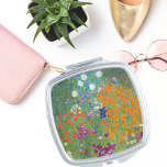 Floral Landscape Gustav Klimt Make-up Spiegeltje<br><div class="desc">Een compacte spiegel met de nieuwe kunstschilderij Gustav Klimt (1862-1918),  Flower Garden (c. 1906). Een tuin vol kleurrijke petunies,  asters en andere bloemen.</div>