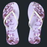 Floral Lila Flowers Wedding Maid of Honor Teenslippers<br><div class="desc">Lilacs is het thema van deze elegante florale Maid of Honor bruiloft teenslippers met roze en lila bloemen op een paarse achtergrond. De tekst kan voor uw speciale gelegenheid worden aangepast.</div>