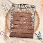 Floral String Lights Rustic Wood Wedding Kaart<br><div class="desc">snaarlichten en een cascade van mooie florale groenery lijsten je speciale trouwfeestdetails op een elegante typografie op een rustige houten achtergrond. Ontworpen door: Thisnotme©</div>