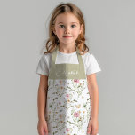 Floral Wildflower Kinder Girly gepersonaliseerd Schort<br><div class="desc">Maak een verklaring in de keuken met dit mooie en vrouwelijke schort. Het bevat een alomvormig wildbloempatroon in tinten roze, blauw beige en grijsgroen. Het gepersonaliseerde schort kenmerkt ook jouw naam op de bovenkant, die het voor het geven van of eigen gebruik perfect maken. Dit schort is zowel stijlvol als...</div>
