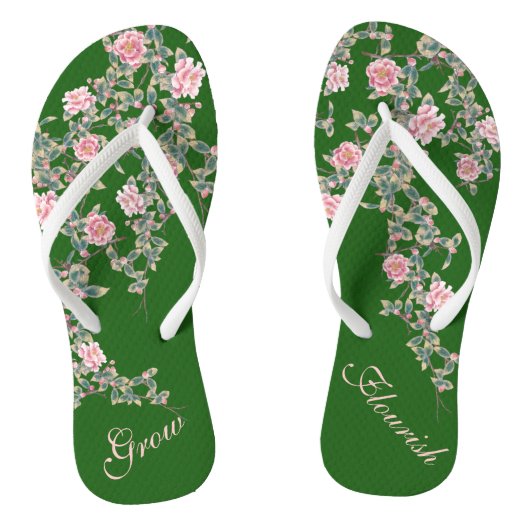 Flourting roze bloemen die de Groene Vlik van het  Teenslippers (Voetbed)