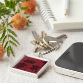 Flowerhead Silhouettes op Crimson Background Sleutelhanger (Zijkant)