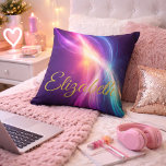 Flowing Waves of Color Kussen<br><div class="desc">Make a bold and beautiful statement with this personalized light wave accent pillow, designed to capture movement, energy, and individuality. Featuring flowing waves of radiant color—blending purples, pinks, blues, and golden light—this design creates a mesmerizing sense of motion against a deep, cosmic-inspired background. The elegant gold script name adds a...</div>