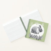 Fluffy hare met vlinders op groene achtergrond notitieboek (Binnen)