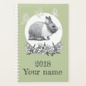Fluffy hare met vlinders op groene achtergrond planner (Voorkant)