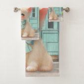 Fluffy kitten met blauwe boog bij banketbakkerij bad handdoek (Insitu)