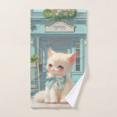 Fluffy kitten met blauwe boog bij banketbakkerij bad handdoek (Handdoek)