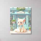Fluffy kitten met blauwe boog bij banketbakkerij canvas afdruk (Voorkant)