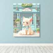 Fluffy kitten met blauwe boog bij banketbakkerij canvas afdruk (Insitu (Houten vloer))