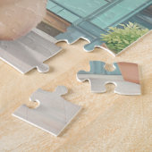 Fluffy kitten met blauwe boog bij banketbakkerij legpuzzel (Zijkant)