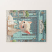 Fluffy kitten met blauwe boog bij banketbakkerij legpuzzel (Horizontaal)