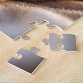 Fluffy red kitten playing with a tiny teddy bear,  legpuzzel (Zijkant)