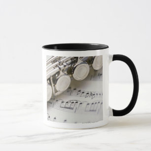 Flute on Sheet Music Mok