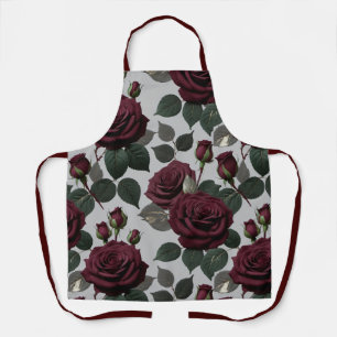 Fluwelen donker bordeauxroze rozen met groene blad schort