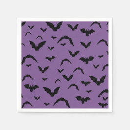 Flying bats on purple servet