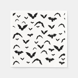Flying bats on white servet
