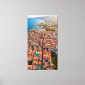 Flying over the rooftops of the town canvas afdruk (Voorkant)