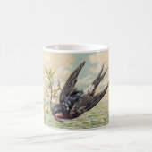 Flying swallow with flower twig koffiemok (Center)
