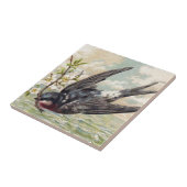 Flying swallow with flower twig tegeltje (Zijkant)