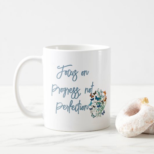 Focus on progress, not perfection koffiemok (Met donut)