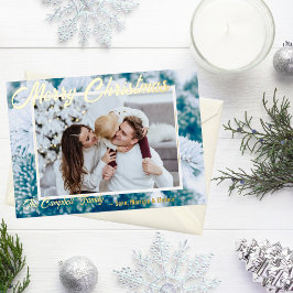 Folie Foto Kerstkaart met Besneeuwde Groene Tak Feestdagenkaart