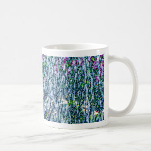 Fonteinspuiten en seringenbloemen koffiemok