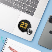 Football helm gepersonaliseerd nummer zwart en gou sticker (Laptop met iPhone)