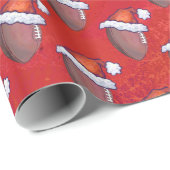 Football in Santa Hat op rood Cadeaupapier (Rol Hoek)