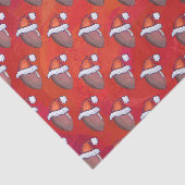 Football in Santa Hat op rood Tissuepapier (Detail)