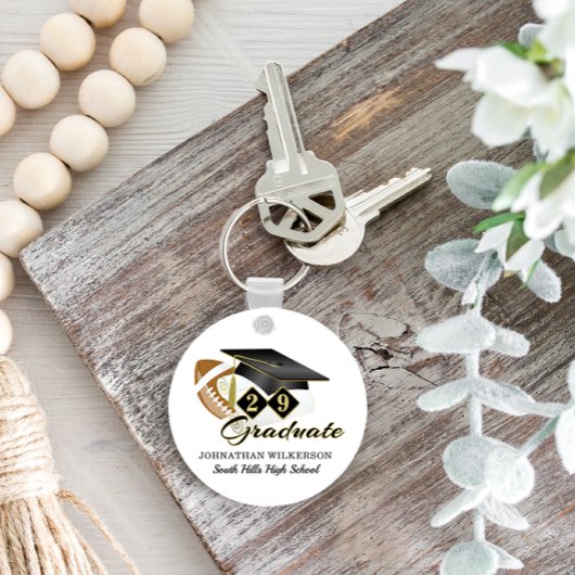 Football met zwarte stuifkast, speciaal aangepast sleutelhanger