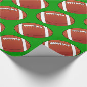 Football over groene cadeaupapier (Hoek)