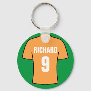 Football shirt in oud goud. sleutelhanger