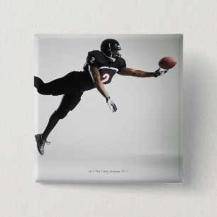 Football speler die in de lucht springt om bal te vierkante button 5,1 cm