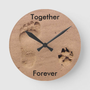 Footprint and Paw Print in Sand Ronde Klok