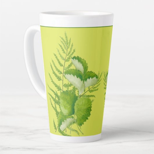 Formulieren in groen op een grote latte Mok (Linkerhoek)