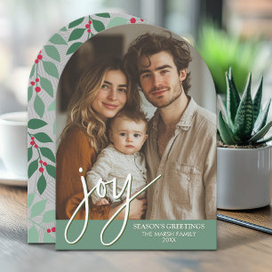 Foto-boog met enorm Joy-script - botanische achter Feestdagenkaart