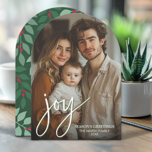 Foto-boog met enorm Joy-script - botanische achter Feestdagenkaart