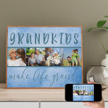 Foto collage - kleinkinderen maken het leven groot poster<br><div class="desc">Creëer je eigen fotocollage voor je grootouders. Dit moderne poster in blauw zal er charmant uitzien en alle grootouders houden van het maken van foto's van hun kleinkinderen. De formulering luidt: "kleinkinderen maken het leven groots" en lijsten je fotostrip. De sjabloon is opstelling klaar voor u om uw eigen afbeeldingen...</div>