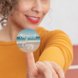 Foto gesigneerd exemplaar aan zee ronde sticker